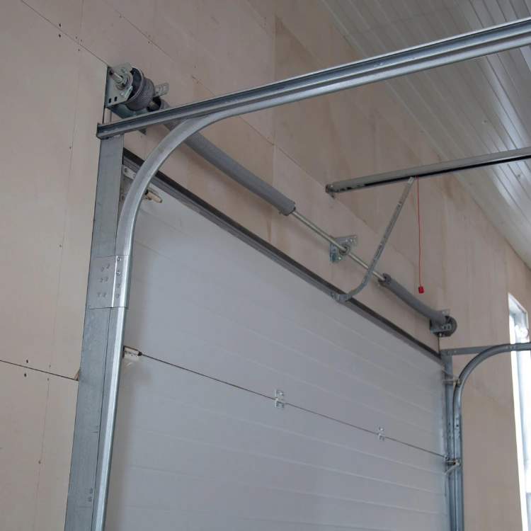 Newly installed or repaired garage door spring system and support tracks
